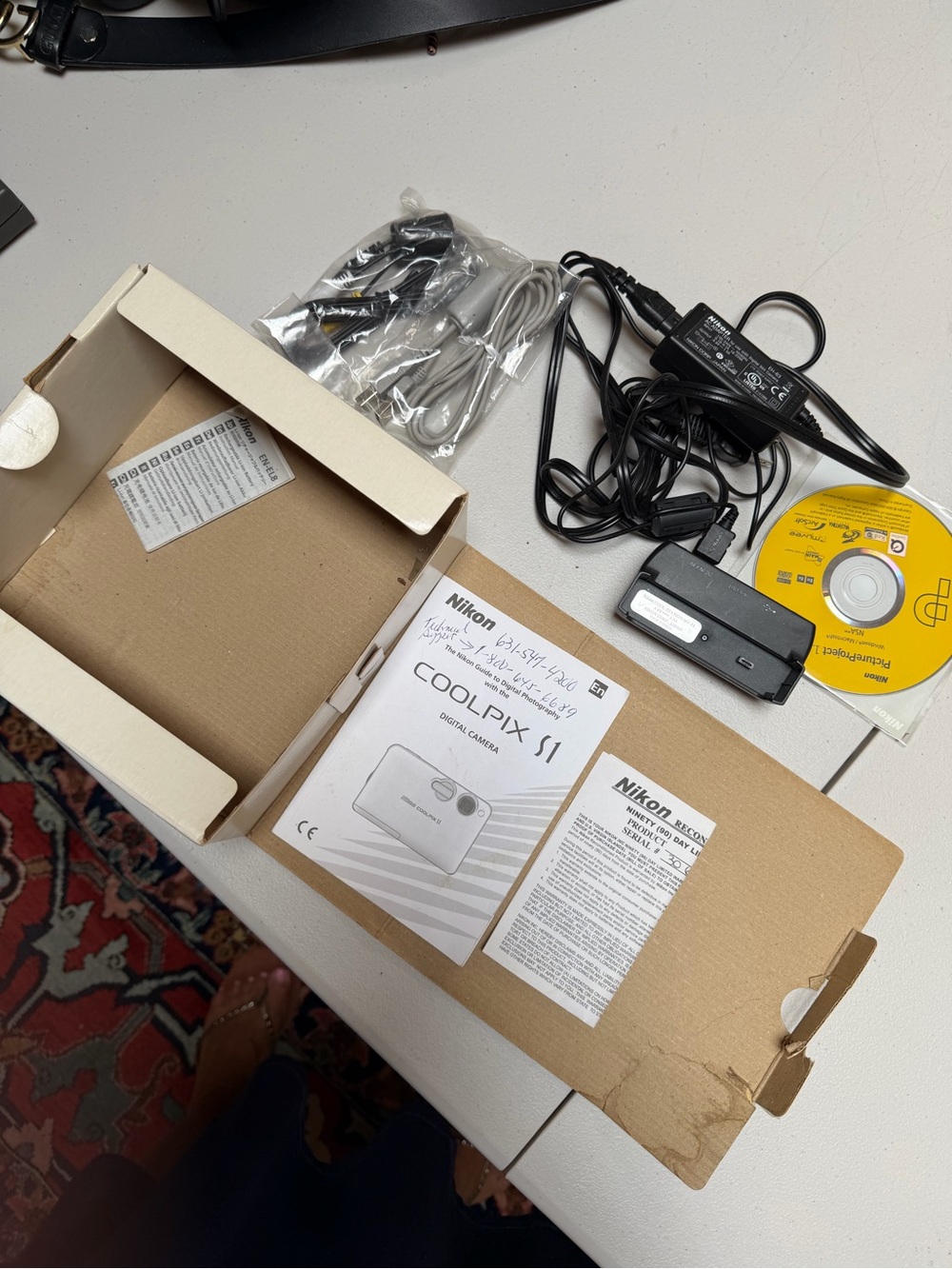 Nikon COOLPIX S1 Camera Owner's Manual + Accessories - White